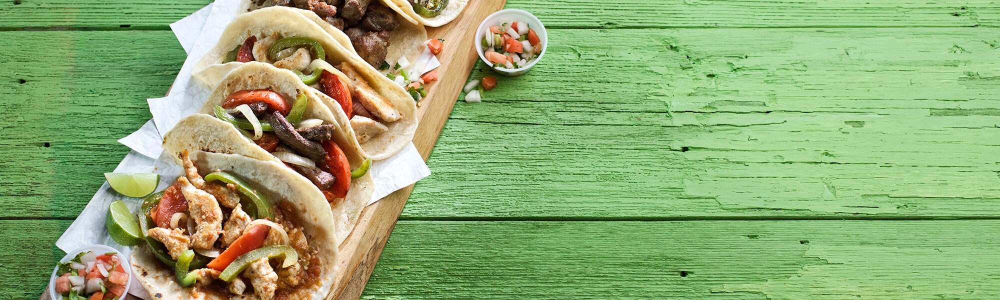 Lunch and Dinner Tacos on Wooden Board